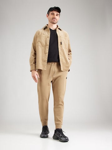 BOSS Конический (Tapered) Штаны 'Locsin' в Бежевый