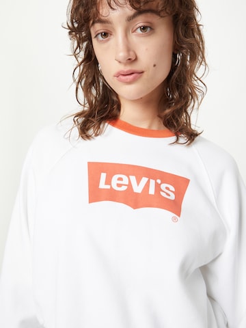 LEVI'S ® Collegepaita 'Vintage Raglan Crewneck Sweatshirt' värissä valkoinen