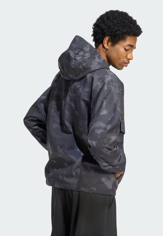 Veste mi-saison 'Camo' ADIDAS ORIGINALS en noir