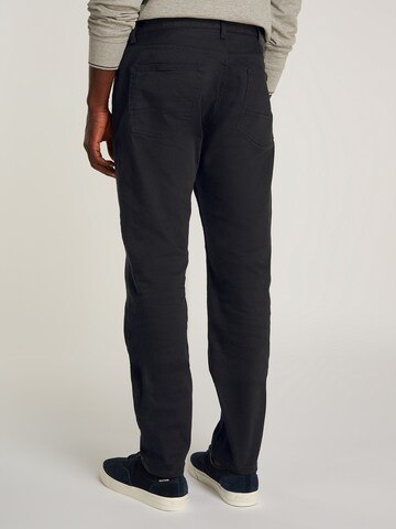 Regular Jean 'HARLEM' TOMMY HILFIGER en noir