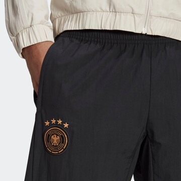 ADIDAS PERFORMANCE Tapered Sportbroek 'Germany Tiro 23 Presentation' in Zwart