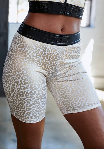 LASCANA ACTIVE Skinny Sportovní kalhoty – zlatá: přední strana