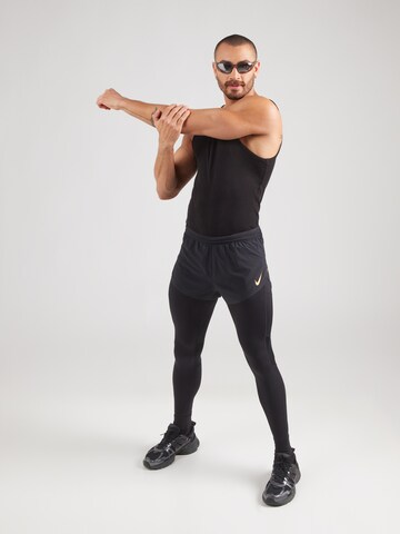 NIKE Обычный Спортивные штаны 'ARSWFT JAKOB' в Черный