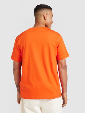 Maglietta di Champion Authentic Athletic Apparel in arancione