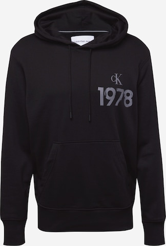 Sweat-shirt Calvin Klein Jeans en noir : devant