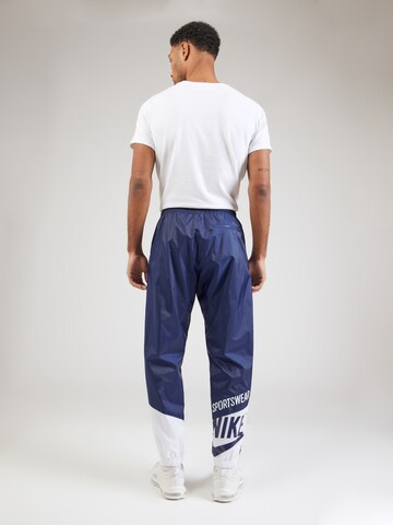 Nike Sportswear Tapered Trousers in Blue