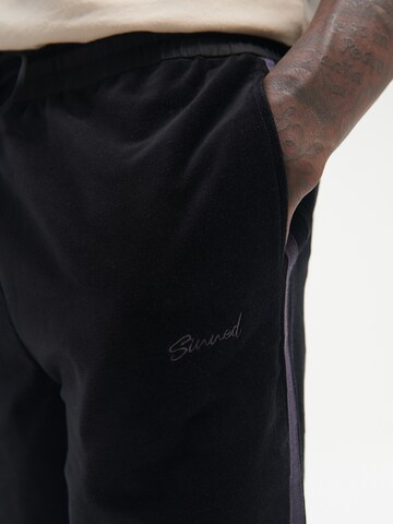 Sinned x ABOUT YOU - regular Pantalón 'LUCA' en negro