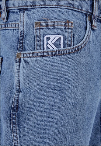 Karl Kani Tapered Jeans i blå