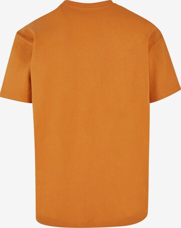 Merchcode T-Shirt 'Think Different' in Orange