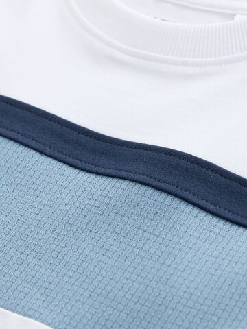 T-Shirt Next en blanc