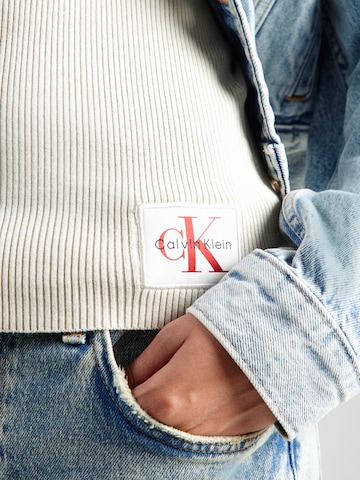 Pull-over Calvin Klein Jeans en blanc