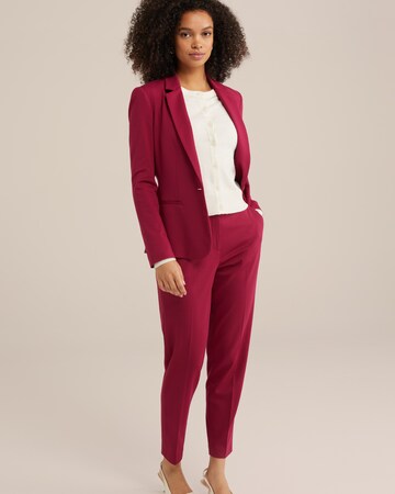Slimfit Pantaloni con piega frontale di WE Fashion in rosso