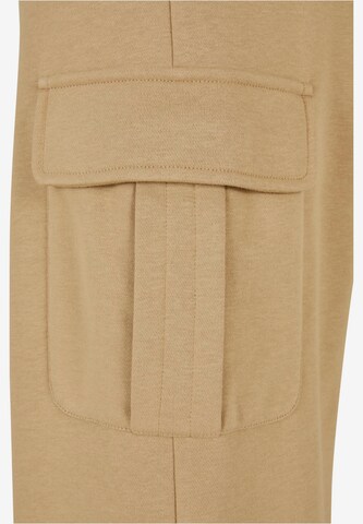 Wide leg Pantaloni cargo di Urban Classics in beige