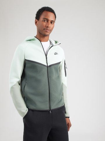 Veste de survêtement 'TCH FLC' Nike Sportswear en vert : devant