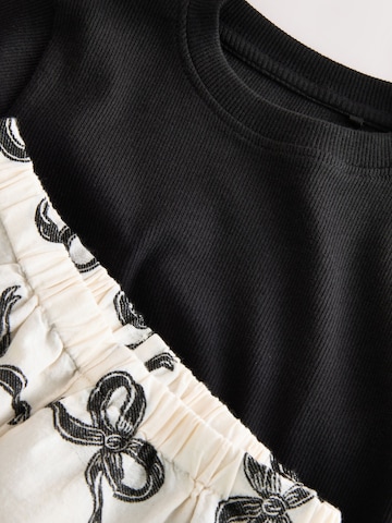 juoda Next Miego kostiumas