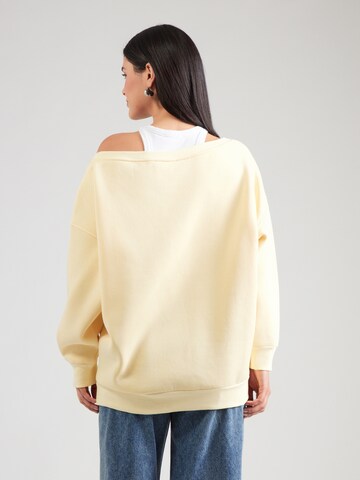 Sweat-shirt 'Asta' ABOUT YOU en jaune