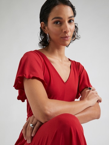 Tuta jumpsuit 'Milly' di ABOUT YOU in rosso