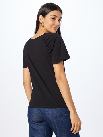 Tricou de la Sisley pe negru