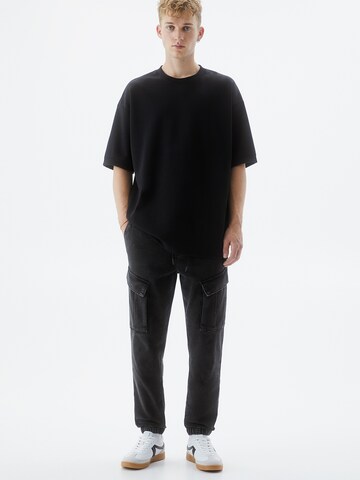 Pull&Bear Tapered Cargo jeans in Black