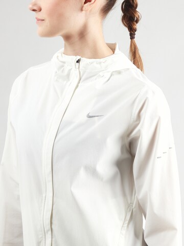 NIKE Αθλητικό μπουφάν 'SWIFT' σε μπεζ