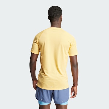 ADIDAS PERFORMANCE - Camisa funcionais 'Own the Run' em amarelo