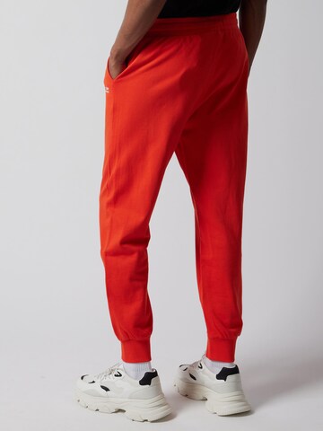 OWN Off With Nature Regular Broek 'Joggers' in Oranje