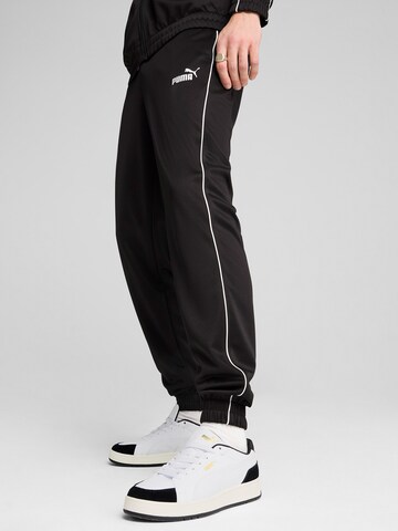 PUMA Tapered Sports trousers in Black
