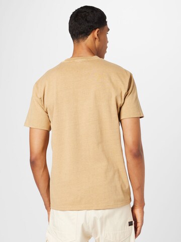 Carhartt WIP - Camiseta 'Duster' en marrón