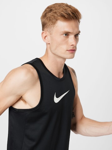 NIKE Sporttop in Schwarz