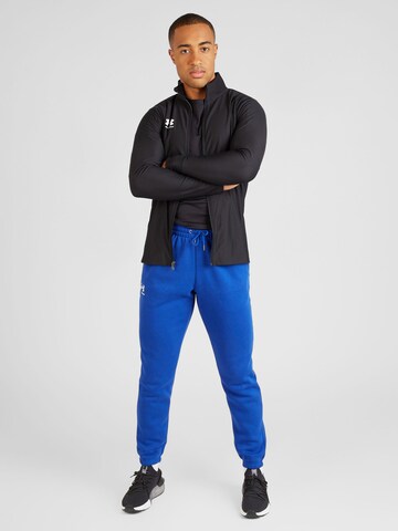 UNDER ARMOUR Zwężany krój Spodnie sportowe 'Essential' w kolorze niebieski