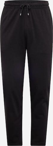 Effilé Pantalon Nike Sportswear en noir : devant