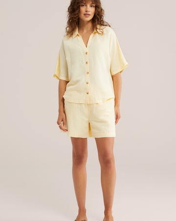 WE Fashion Ohlapna forma Hlače | rumena barva