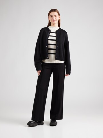 Freequent Sweter w kolorze beżowy