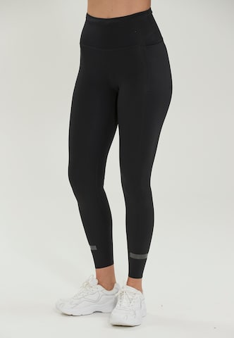 Athlecia Slimfit Sportbroek 'Douna' in Zwart: voorkant