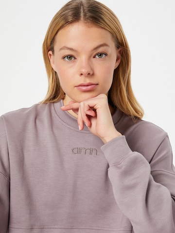 aim'n - Sweatshirt de desporto em roxo