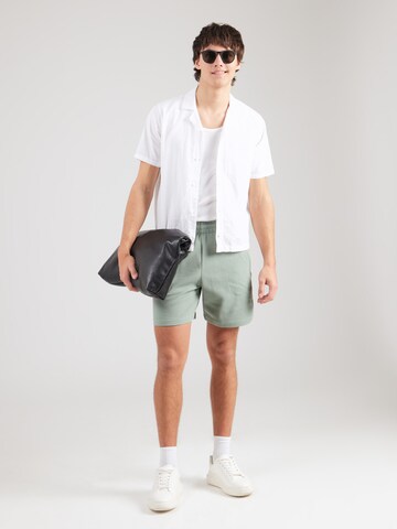 regular Pantaloni 'Essentials' di ADIDAS ORIGINALS in verde
