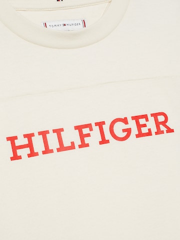 TOMMY HILFIGER Koszulka 'Monotype Varsity' w kolorze beżowy