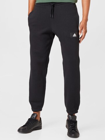 ADIDAS SPORTSWEAR Tapered Workout Pants 'Essentials Feelvivid  Fleece Straight' in Black: front