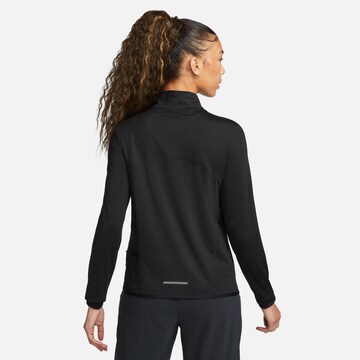 NIKE Funktionsbluse 'SWIFT ELEMENT' i sort