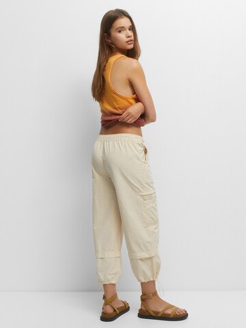 Pull&Bear Loose fit Cargo trousers in Yellow