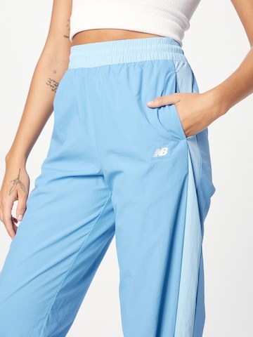 new balance Tapered Sportbroek 'Athletics' in Blauw