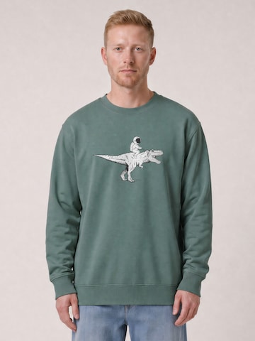 Watapparel Sweatshirt 'Astronaut On T-Rex' in Groen: voorkant