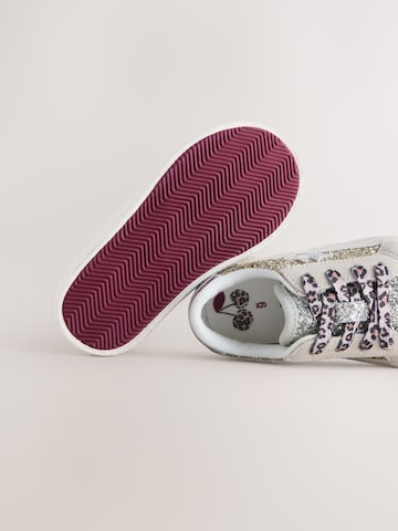 Baskets Next en or