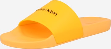 Calvin Klein - Zapatos abiertos en naranja: frente