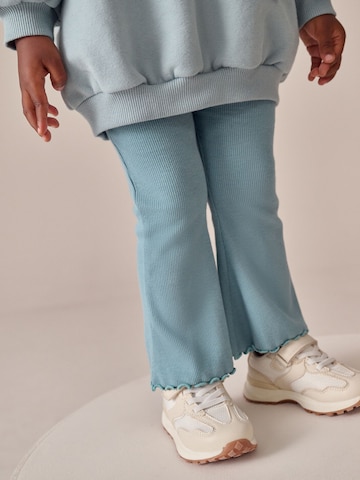 Set Next en bleu