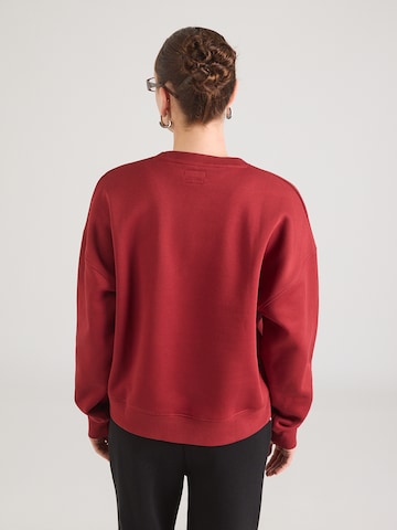 Felpa 'ICONIC' di GUESS JEANS in rosso