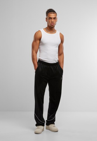 regular Pantaloni sportivi di Karl Kani in nero