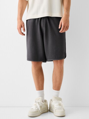 Bershka Loosefit Shorts in Schwarz: Vorderseite