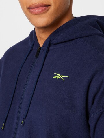 Reebok - Sudadera con cremallera deportiva en azul