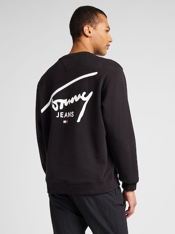 Tommy Jeans Sweatshirt in Zwart: voorkant